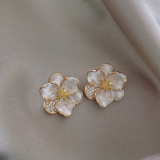 white flower fairy earrings